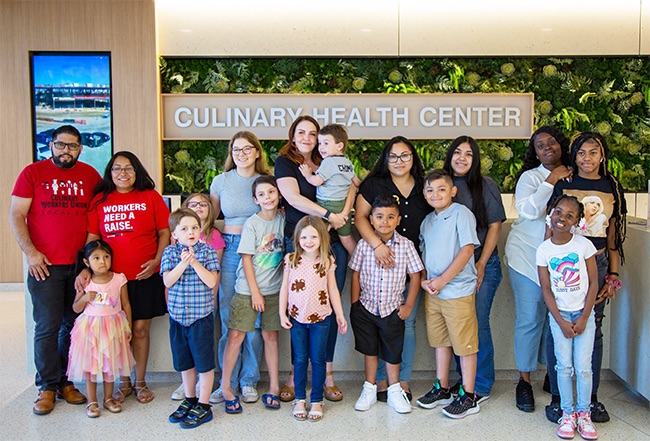 Participants standing in front of the Culinary Health Center reception desk